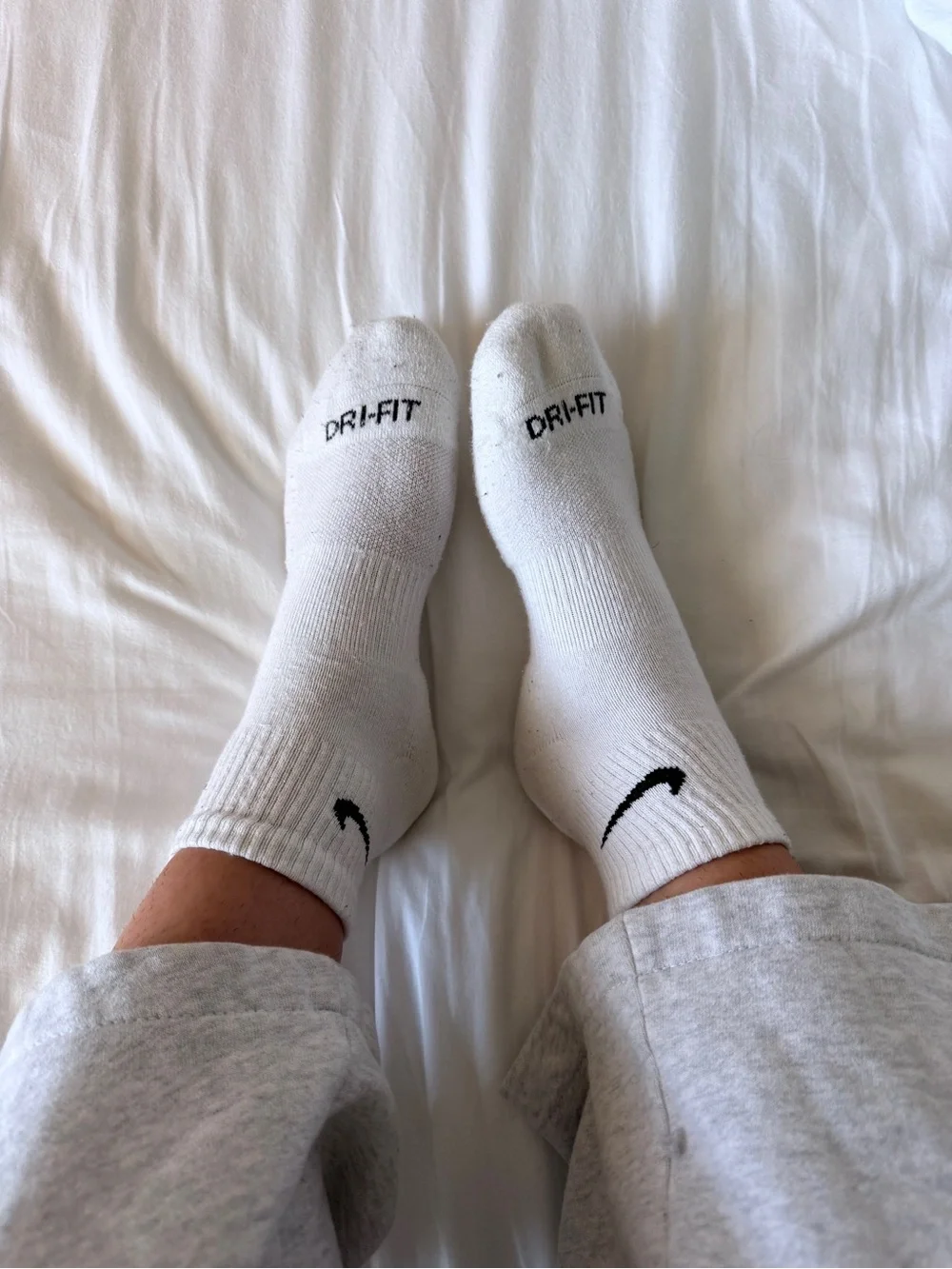 Nike White Athletic Dri-FIT Crew Socks with Black Swoosh